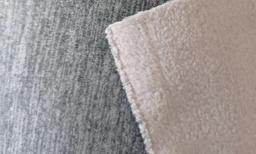 Cationic composite shaker fleece
